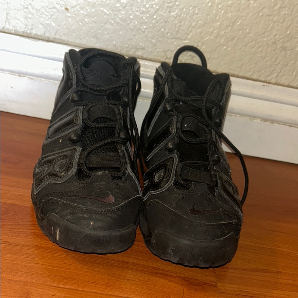 Youth all black Nike Uptempo